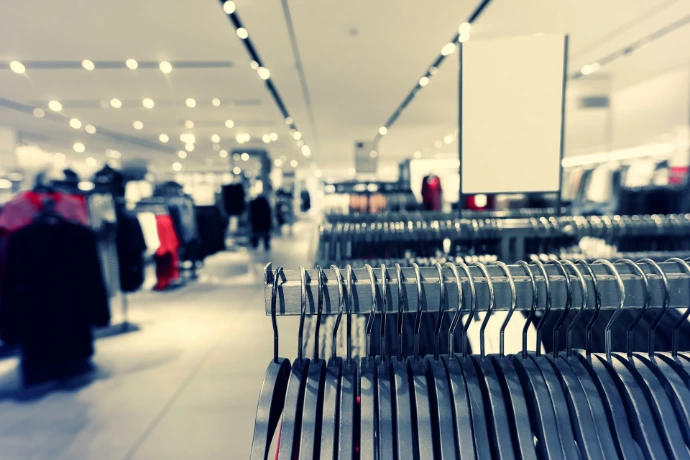 a store filled with lots of clothes and luggage